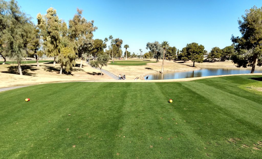 Hole # 8 Ken McDonald course in Tempe, AZ. Located in the metropolitan Phoenix area, the affordably priced Ken McDonald Golf Course is a championship-length course that is suitable for any level of golfer. The flat terrain of the course makes for an enjoyable stroll, while the water hazards that come into play on eight holes provide plenty of challenge. The water hazards are provided by the Western Canal, which flows directly through the golf course. The par-5 11th hole is the longest on the course at 570 yards; it is very difficult to reach in two shots. In addition to the course, Ken McDonald Golf Course offers several other amenities including a restaurant, club fitting and repairs, and professional golf instruction